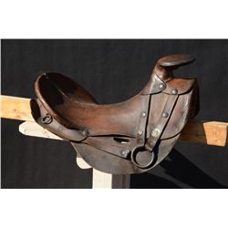 Hope style saddle showing recovering during  period of use and old frontier repairs.  The  leather c