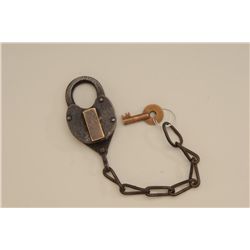 Railroad type iron lock and chain with key;  lock marked “W.F. CO. EX” in good condition.   Est.:  $