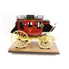 Image 1 : Handmade and carved from wood miniature  stagecoach with painted decoration displaying  “Wells Fargo