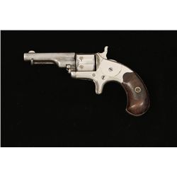 Colt Model 1872 .22 caliber, 7 shot open top  revolver in early production series with  integral eje
