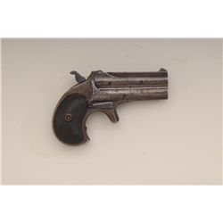 Remington O/U derringer, .41 cal., 3”  barrels, blue finish, checkered hard rubber  grips, #666. Thi