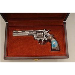 Colt Python .357 Magnum double action  revolver stainless steel with 6” barrel, deep  scroll engrave