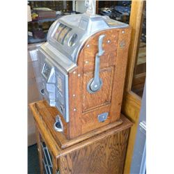 Rock – Ola 5 cent slot machine with wood  sides showing last patent date of January 17,  1922. Very 
