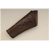 Image 2 : Floral tooled leather holster with rawhide  trim marked “C. I. Tibiletti, Victoria, Tex.”  in overal