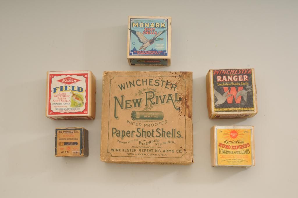 Lot of antique collectors shotgun shell boxes some with ammo. Number ...