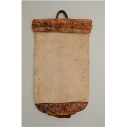 Old heavy duty commercial canvas mail bag  with leather base, top, securing rings, strap  and leathe