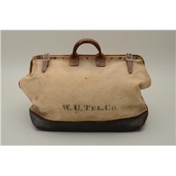 Old canvas and leather grip bag stenciled  “W.U. Tel. Co.” approx. 16” in height, 23”  wide and 9” d