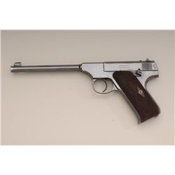 Colt pre-war Woodsman .22 caliber  semi-automatic pistol with 6 ½” barrel, blued  finish, wood grips