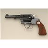 Image 1 : Colt Police Positive Special DA revolver, .38  Spl. cal., 4” barrel, blue finish, checkered  wood me