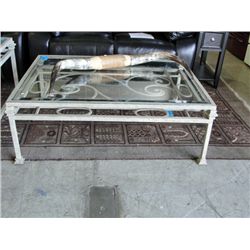Wrought iron with bevelled glass top coffee table