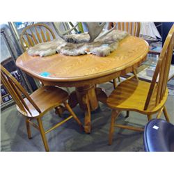 Single pedastol oak dining table with one leaf and