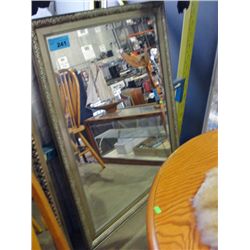 Silver ish gold framed bevelled wall mirror