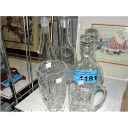 4 assorted crystal decanters, one vase and one mug