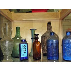 Shelf lot of vintage collectors bottles, vase, etc