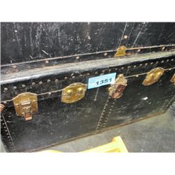 Vintage black steamer trunk