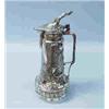 Image 1 : A good German WMF figural tankard. Decorated in relief with hunting motives. 15" high. Circa 1900. 1