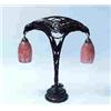 Image 1 : DAUM & MAJORELLE - An unusual hand-hammered iron table lamp by Louis Majorelle. With two art glass s