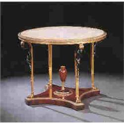 A fine antique French gilt bronze and mahogany centre table in the manner of Francois Linke. The cir