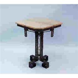 ART DECO - An unusual hammered and wrought steel salon table with marble top. The pierce worked colu