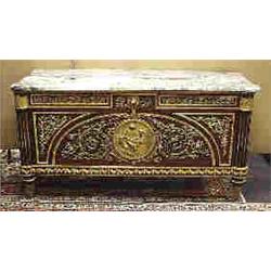 An important antique French gilt bronze mounted mahogany and tulipwood "Marie Antoinette" commode wi