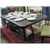 Image 1 : Contemporary dark oak dining table