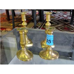 2 pairs of brass candle stick holders