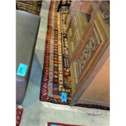 Approx 4F by 10F hand knotted persian area rug