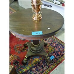Round parlour table with guilded accents