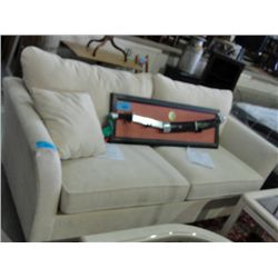 Off white upholstered contemporary sofa