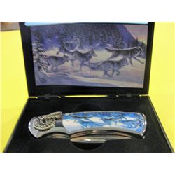 One collectors lock blade jack knife with wolf