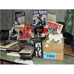 Large shelf lot of sports memorablilia; books,