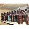 Image 1 : Shelf lot of assorted beer bottles