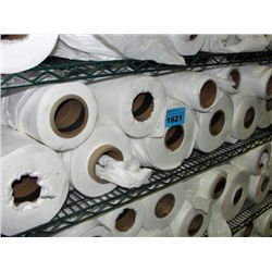 One shelf lot filled with assorted rolls of white
