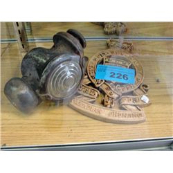 Vintage mariner lantern and wooden plaque