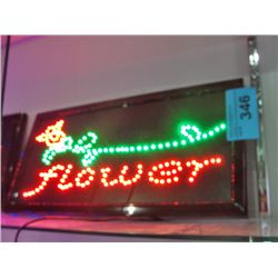 Lighted flower shop sign