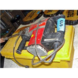 Hilti hammer drill with yellow toolbox full of