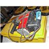 Image 1 : Hilti hammer drill with yellow toolbox full of