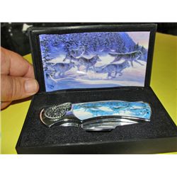 Collectors lockblade jack knife with wolf pack