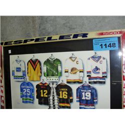 Framed NHL canuck jerseys print