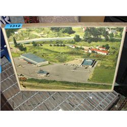 Framed vintage coop hardware store aerial photo