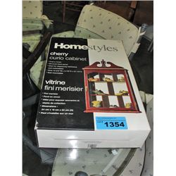 Homestyles cherry curio cabinet