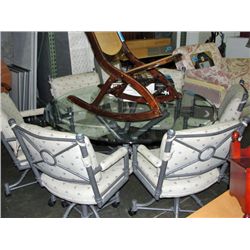 Large metal based bevelled glass top round dining