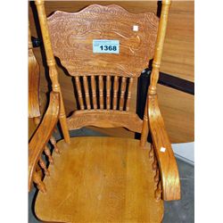 One oak pressed back dining room arm chair