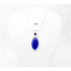 Polished stone pendant on sterling silver necklace