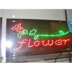 Lighted flower shop sign
