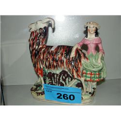 STaffordshire pottery figurine candle holder