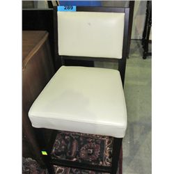 White leather padded barstool