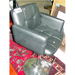 Black leather and chrome gas lift bar stool