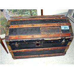 Antique dome top steamer trunk