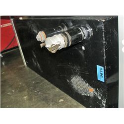 Large black metal fuel storage tank